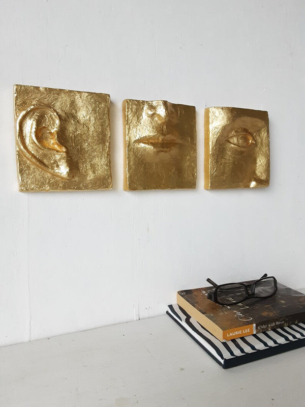 Gold wall art, ceramic faces set of three, classic contemporary sculpture with minimalist feel