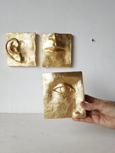 Gold wall art, ceramic faces set of three, classic contemporary sculpture with minimalist feel