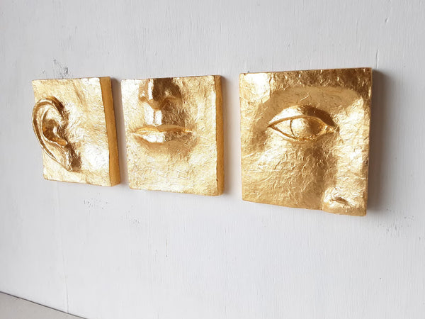 Gold wall art, ceramic faces set of three, classic contemporary sculpture with minimalist feel