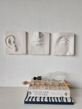 White wall art triptych, handmade ceramic classic sculpture of face in three parts, hear no see no speak no evil