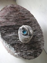 Ceramic sculpture in blue white gray with fish net, barnacles and coral, beach decor