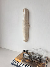 White wall hanging sculpture, with crazed and crackle glazes, modern ceramic art