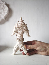 Mummy sculpture wrapped in string and handmade beads, ceramic fetish doll, tribal decor