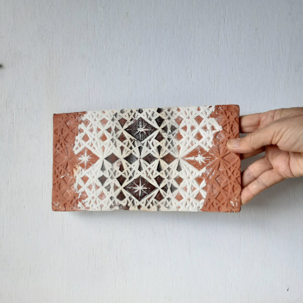 Rectangular terracotta plaque with embossed crystal pattern, Moroccan style small wall sculpture