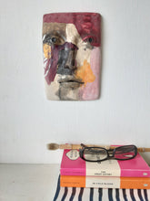 Pink and gray ceramic abstract face, colorful modernist style 3D sculpture wall mask