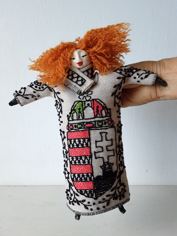 Red haired doll with Hungarian embroidered St Stephen's crest on beige linen body and ceramic parts, bedroom decor