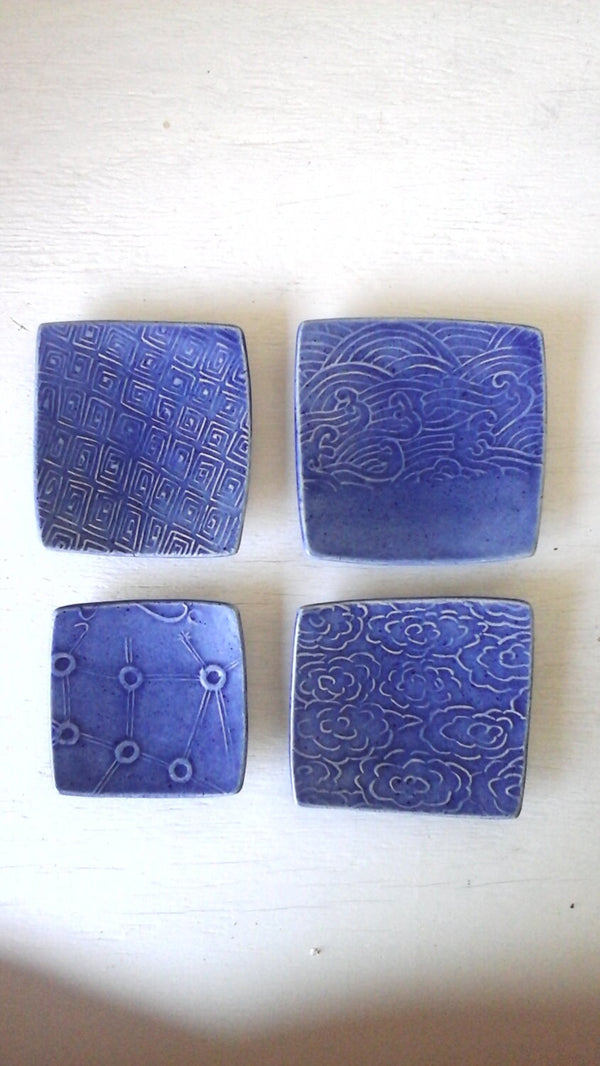 Blue plates in a modern Asian style, set of four square serving dishes for sweets or condiments