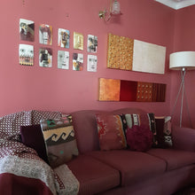 Pink and brown striped wall mask, ceramic sculpture of face