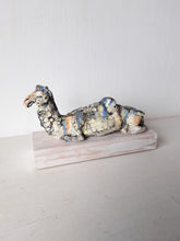 Desert camel with sandy colours, ceramic sculpture on timber mount, Sahara nomad art