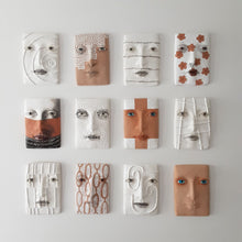 Terracotta orange and white wall mask sculpture with diamond pattern, ceramic face art, tribal style art lover gift