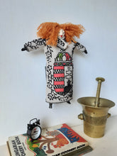 Red haired doll with Hungarian embroidered St Stephen's crest on beige linen body and ceramic parts, bedroom decor