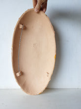 Gold ceramic wall sculpture carved into oval shape, Modernist luxe gilt wall decor