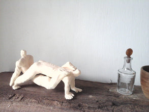 Naked male wrestlers sculpture in pale polished terracotta, nude pair of gymnastic men