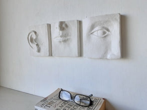 White wall art triptych, handmade ceramic classic sculpture of face in three parts, hear no see no speak no evil