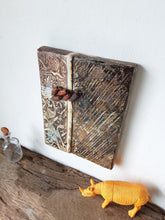 Rustic wall art, brown ceramic wall sculpture with embossed pattern, handmade art tile