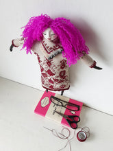 Pink haired female doll, with crimson pattern on beige embroidered linen body, ceramic body parts, boudoir decor