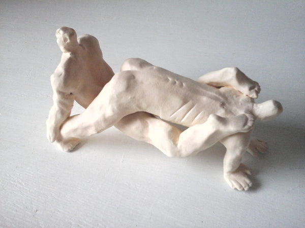 Naked male wrestlers sculpture in pale polished terracotta, nude pair of gymnastic men