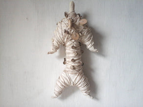 Mummy sculpture wrapped in string and handmade beads, ceramic fetish doll, tribal decor