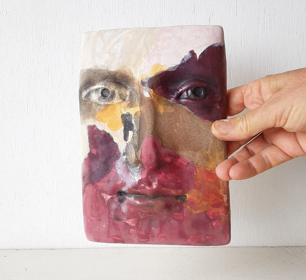 Pink purple and orange abstract ceramic wall sculpture face, 3D modern art work