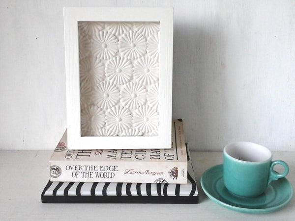 Ceramic wall art with embossed daisy flower texture, minimalist decor for housewarming gift