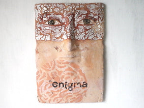 Wall sculpture of human face, ceramic art mask, rustic bedroom decor, enigma artwork from Louise Fulton Studio