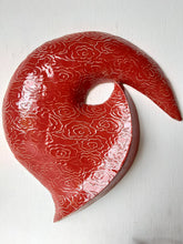 Red ceramic wall sculpture with embossed Chinese cloud design, auspicious dragon fang art, lucky Asian gift