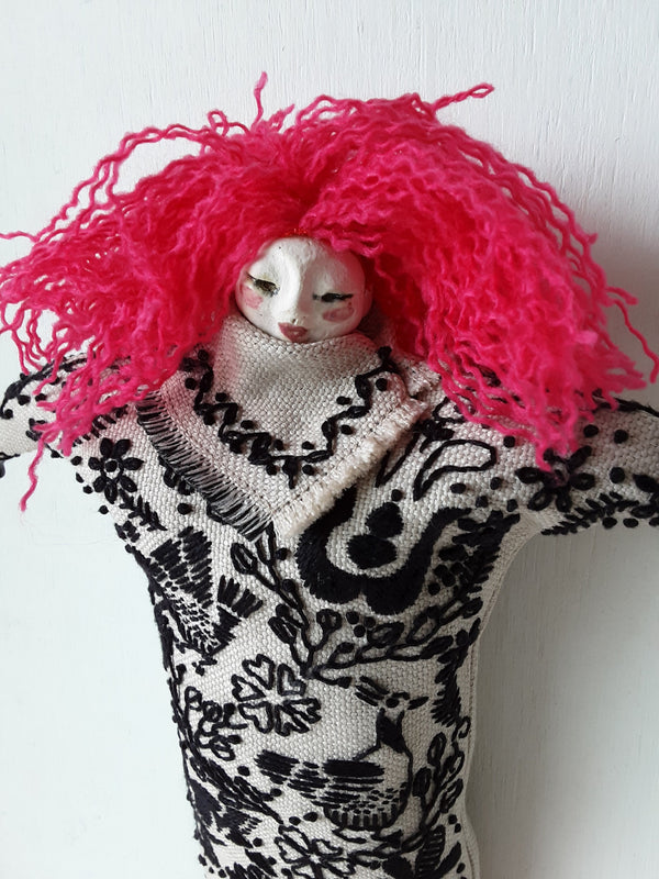 Pink haired female doll, with black on beige embroidered linen body, ceramic head, arms and legs, boudoir decor