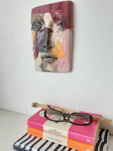 Pink and gray ceramic abstract face, colorful modernist style 3D sculpture wall mask