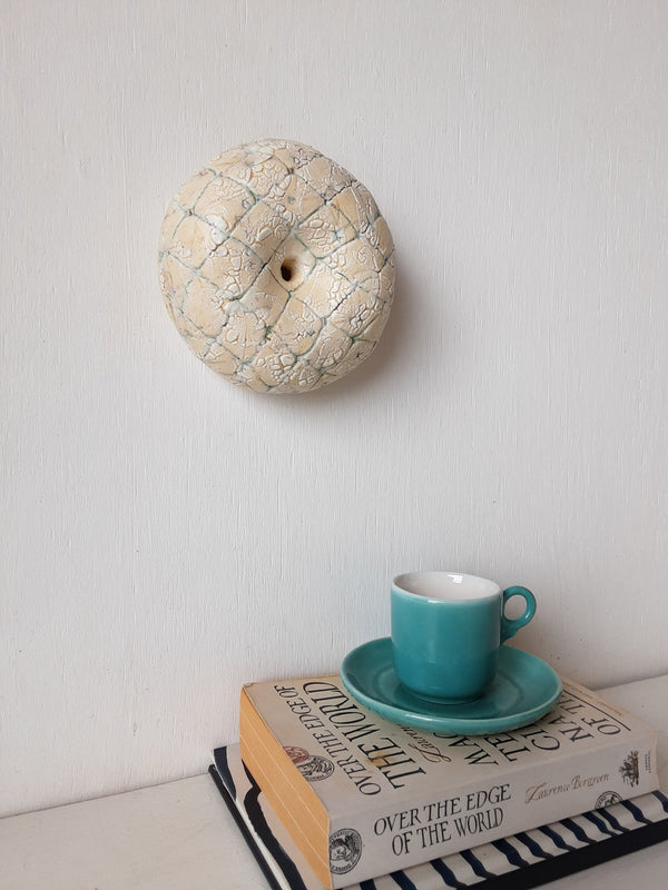 Abstract, round ceramic wall sculpture 3d wall hanging with antique white and copper patina, toroidal wall art