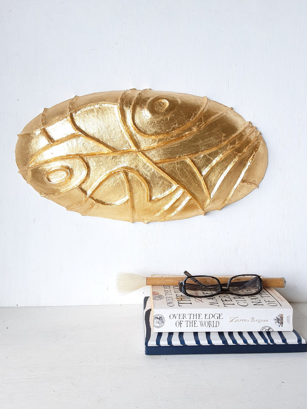 Gold ceramic wall sculpture carved into oval shape, Modernist luxe gilt wall decor