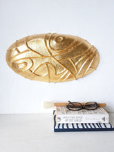 Gold ceramic wall sculpture carved into oval shape, Modernist luxe gilt wall decor