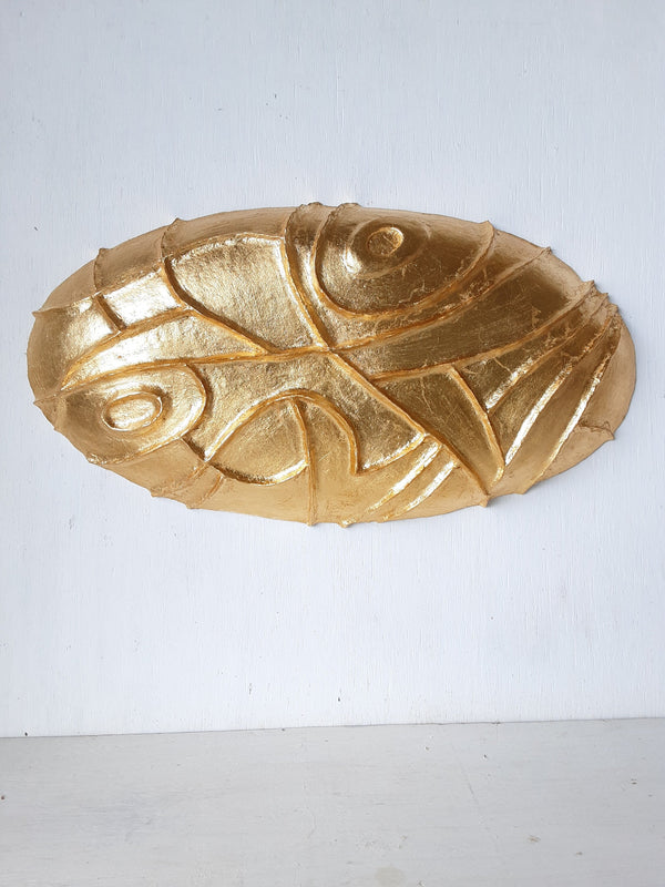 Gold ceramic wall sculpture carved into oval shape, Modernist luxe gilt wall decor