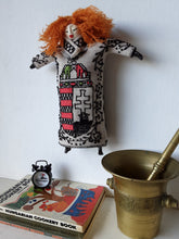 Red haired doll with Hungarian embroidered St Stephen's crest on beige linen body and ceramic parts, bedroom decor