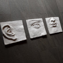 Large white art triptych, ceramic classic sculpture of face in three parts, hear no see no speak no evil