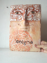 Wall sculpture of human face, ceramic art mask, rustic bedroom decor, enigma artwork from Louise Fulton Studio